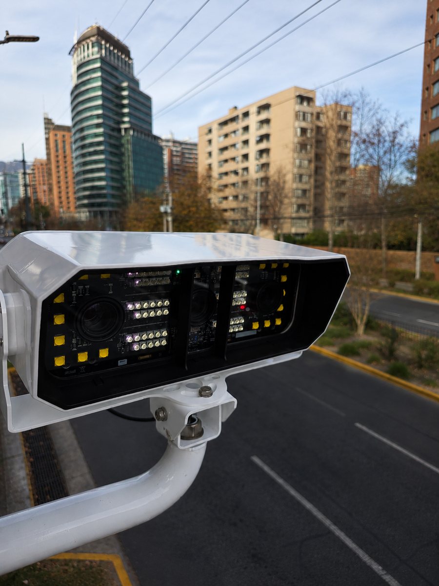 TechVial observation camera over an urban avenue